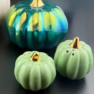 Sage green with gold stems salt & pepper shakers.